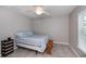 Bedroom with ceiling fan and tiled floor at 12112 Helios Ave, Port Charlotte, FL 33981