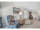 Relaxing living room with two armchairs and side table at 235 Rotonda Blvd W # C203, Rotonda West, FL 33947