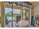 Spacious balcony with pool view and comfortable seating at 235 Rotonda Blvd W # C203, Rotonda West, FL 33947