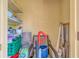 Storage room with shelving for various household items at 235 Rotonda Blvd W # C203, Rotonda West, FL 33947