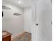Inviting entryway with tiled floor, a coat closet and decorative wall art at 235 Rotonda Blvd W # C203, Rotonda West, FL 33947