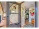 Bright condo entryway with access to interior at 235 Rotonda Blvd W # C203, Rotonda West, FL 33947