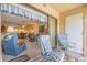 Relaxing balcony with sliding doors leading to the living area at 235 Rotonda Blvd W # C203, Rotonda West, FL 33947