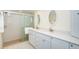 Double vanity bathroom with walk-in shower and modern finishes at 7104 Palm Island Dr # Le38, Placida, FL 33946
