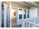 Private balcony with access to a bedroom and partial ocean view at 7104 Palm Island Dr # Le38, Placida, FL 33946
