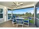 Relaxing screened porch with outdoor seating and stunning ocean views at 7104 Palm Island Dr # Le38, Placida, FL 33946