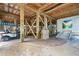 Under house storage area with golf cart and boat storage at 7104 Palm Island Dr # Le38, Placida, FL 33946