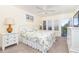Spacious main bedroom with king-size bed and access to balcony at 7104 Palm Island Dr # Le38, Placida, FL 33946
