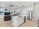 Large kitchen island with seating, perfect for casual dining and entertaining at 9239 Harvester St, Port Charlotte, FL 33981