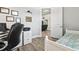 Bedroom with a computer desk, bed, and built-in storage at 9239 Harvester St, Port Charlotte, FL 33981