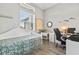 Home office with daybed, work desk, and ample natural light at 9239 Harvester St, Port Charlotte, FL 33981