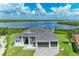 Stunning waterfront home with a private dock, lush lawn and beautiful views of the bay at 16147 Lankford Ct, Port Charlotte, FL 33981