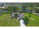 Waterfront home boasting lush landscaping and a private dock at 2516 Dixon Ter, Port Charlotte, FL 33981