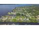 Waterfront community with a yellow circle highlighting the house at 2516 Dixon Ter, Port Charlotte, FL 33981