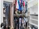 Walk-in closet featuring extensive hanging storage with rods and overhead shelving, plus wire basket shelves at 2516 Dixon Ter, Port Charlotte, FL 33981