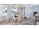 Dining room features tile floors, matching dining set, and a large cabinet for storage at 2516 Dixon Ter, Port Charlotte, FL 33981