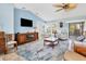 Cozy living room featuring high ceilings, tile flooring, and lots of natural light at 2516 Dixon Ter, Port Charlotte, FL 33981