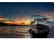 Boat docked at a pier during a colorful sunset at 3862 59Th W Ave, Bradenton, FL 34210