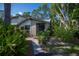 Quaint condo with a private walkway leading to the entrance at 139 Jose Gaspar Dr # 139, Englewood, FL 34223