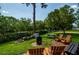Fire pit area with seating, picnic tables, and waterfront views at 139 Jose Gaspar Dr # 139, Englewood, FL 34223