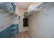 Spacious walk-in closet with wire shelving, providing ample storage at 139 Jose Gaspar Dr # 139, Englewood, FL 34223