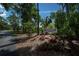 Gasparilla Condominium entrance with lush landscaping and signage at 139 Jose Gaspar Dr # 139, Englewood, FL 34223
