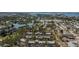 Aerial view of a waterfront community with lush landscaping at 139 Jose Gaspar Dr # 139, Englewood, FL 34223