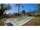 Community shuffleboard courts with benches, providing recreational space at 139 Jose Gaspar Dr # 139, Englewood, FL 34223
