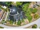 Aerial view of a canal front property with multiple boat slips and lush vegetation at 6551 Hamlet Dr # 22A, Englewood, FL 34224