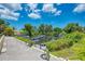 Private boat dock with access to the canal, surrounded by greenery at 6551 Hamlet Dr # 22A, Englewood, FL 34224