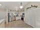Updated kitchen with stainless steel appliances and ample cabinet space at 6551 Hamlet Dr # 22A, Englewood, FL 34224