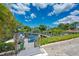 Private community boat dock with multiple slips and lush landscaping at 6551 Hamlet Dr # 22A, Englewood, FL 34224
