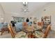 Bright dining area with view of living room and kitchen at 6551 Hamlet Dr # 22A, Englewood, FL 34224