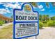 Gulf Wind Villas private boat dock sign with usage guidelines at 6551 Hamlet Dr # 22A, Englewood, FL 34224