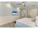 Main bedroom with sliding barn door and access to bathroom at 16147 Lankford Ct, Port Charlotte, FL 33981