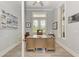 Bright home office with built-in desk and large windows at 16147 Lankford Ct, Port Charlotte, FL 33981