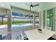 Relaxing poolside patio with seating and stunning water views at 16147 Lankford Ct, Port Charlotte, FL 33981