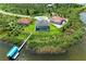 Luxury waterfront home with private dock and pool; multiple houses visible at 16147 Lankford Ct, Port Charlotte, FL 33981