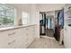 Spacious walk-in closets, built-ins, and granite countertop at 16147 Lankford Ct, Port Charlotte, FL 33981