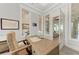 Spacious home office with glass doors and built-in desk at 16147 Lankford Ct, Port Charlotte, FL 33981