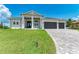 Two story home with two car garage and stone driveway at 16147 Lankford Ct, Port Charlotte, FL 33981
