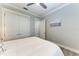 Spacious bedroom with double doors leading to the bathroom and a tranquil atmosphere at 16147 Lankford Ct, Port Charlotte, FL 33981