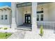 Elegant entry with double doors and a decorative mirror at 16147 Lankford Ct, Port Charlotte, FL 33981