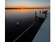 Relaxing sunset view over the water from a private dock at 16147 Lankford Ct, Port Charlotte, FL 33981