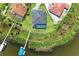 Bird's-eye view of a waterfront house with pool and private dock at 16147 Lankford Ct, Port Charlotte, FL 33981