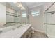 Modern bathroom with quartz countertop and glass shower at 16147 Lankford Ct, Port Charlotte, FL 33981