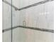Clean and modern walk-in shower with glass enclosure at 16147 Lankford Ct, Port Charlotte, FL 33981