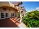 Relaxing clubhouse patio with arches and terracotta tile flooring at 23465 Harborview Rd # 1021, Punta Gorda, FL 33980