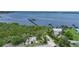 Aerial view showing home, dock, and boat storage at 23465 Harborview Rd # 1021, Punta Gorda, FL 33980