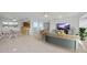 Open living and dining area with tile floors and modern decor at 23465 Harborview Rd # 1021, Punta Gorda, FL 33980